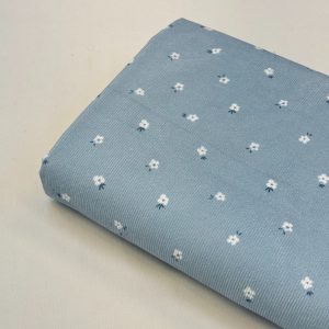 پارچه مخمل کبریتی زمینه آبی گل ریز