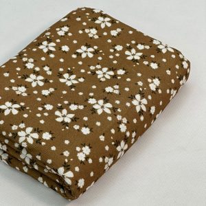 پارچه کبریتی ریز قهوه ای طرح گل