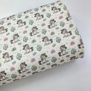 پارچه تریکو میله ای سفید طرح یونیکورن