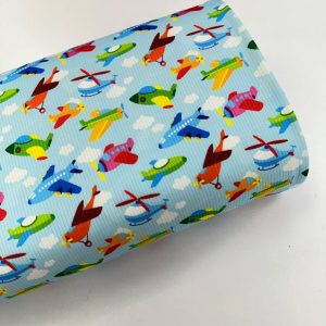 پارچه تریکو میله ای آبی طرح هواپیما