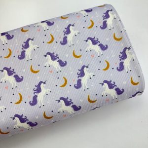 پارچه تریکو میله ای یاسی طرح یونیکورن