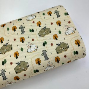 پارچه تریکو میله ای کرم طرح خرس و خرگوش