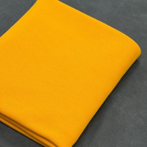 پارچه تریکو میله ای زرد