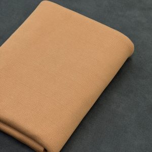 پارچه تریکو میله ای نخودی