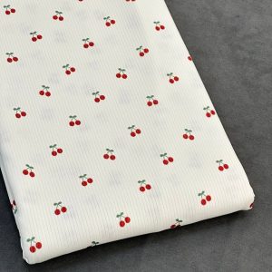 خرید پارچه تریکو میله ای سفید طرح آلبالو