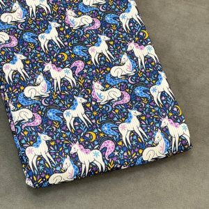 خرید پارچه تریکو میله ای سرمه ای طرح یونیکورن