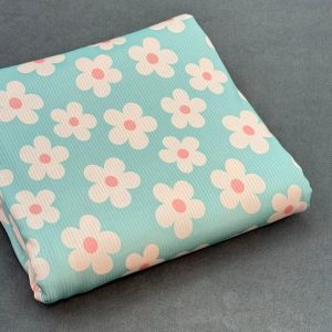 پارچه تریکو میله ای آبی روشن گل سفید