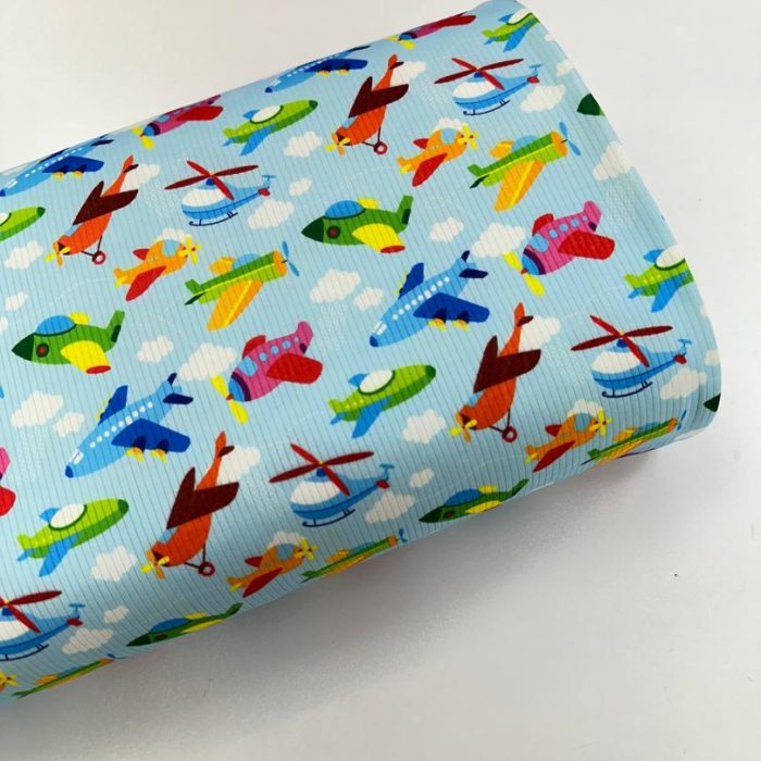 پارچه تریکو میله ای آبی طرح هواپیما