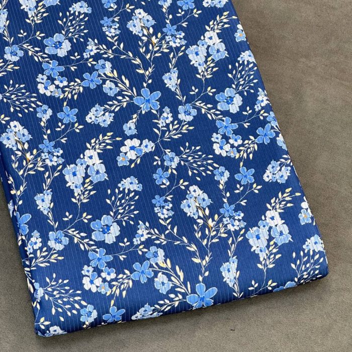 خرید پارچه تریکو میله ای سرمه ای طرح گل آبی