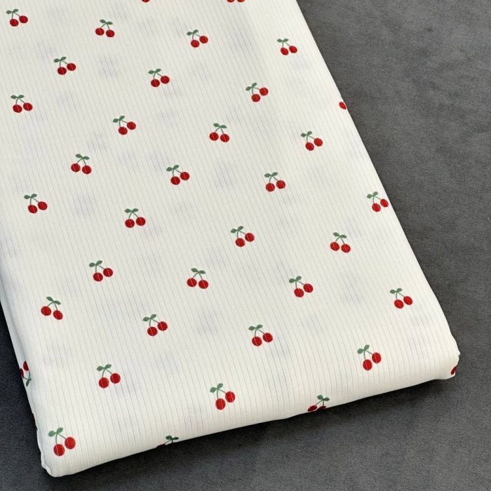 خرید پارچه تریکو میله ای سفید طرح آلبالو